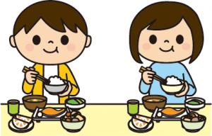 ご飯を食べる男の子と女の子のイラスト